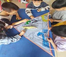 新宁县清江桥乡中间幼儿园开展风筝舞春意——巧手绘风筝教育运动