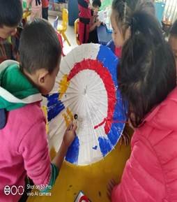 新宁县清江桥乡中间幼儿园开展伞动时光