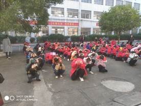 武冈市红星小学举行防震、消防、防恐、防暴综合安全应急疏散集中演练