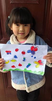 新宁县清江桥乡中间幼儿园开展“”创意手指印画”主题教育运动