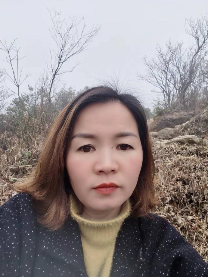 捧着一颗心来 不带半根草去  ——新宁县万塘乡中心小学优秀教师罗靖老师