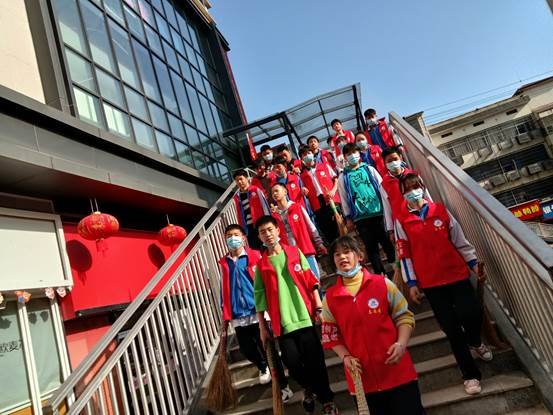 塘渡口中学开展志愿者服务活动 ——-共创文明城市、共建文明校园