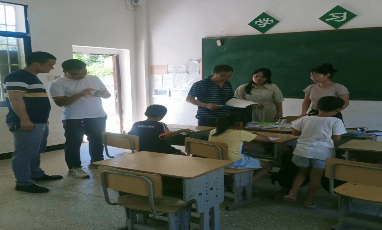 塘田市镇中心学校工作督导