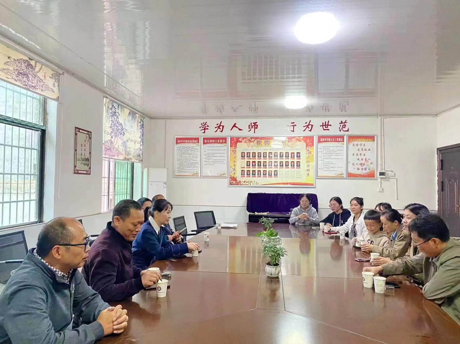 携手合作共发展 校际交流促提升